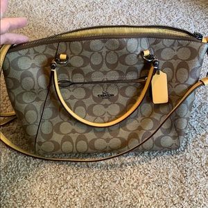 Coach Prairie Canvas signature brown mustard